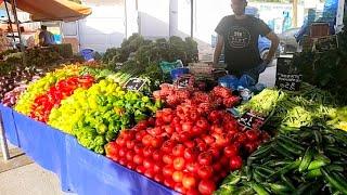 Walking in a colourful farmer's market in Athens, Greece