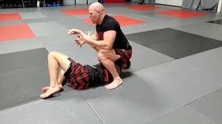 How to do a far side arm bar from side control