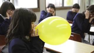 japanese school girls plying with balloons