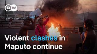 Demonstrators clash with police in Mozambique over 'rigged' election | DW News