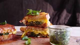 breakfast grilled cheese with soft scrambled eggs and pesto