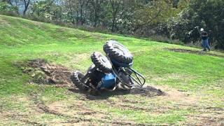 Tractor rolling over on a hillside