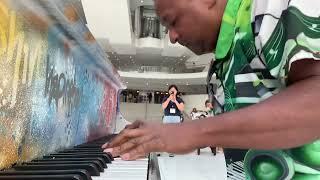 Kris Nicholson playing the World Trade Center Oculus Grand Piano Video 2