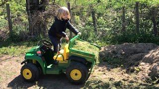 John Deere Peg Perego ride on gator for kids - great fun and a handy toy for gardening chores