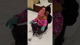 Adamo with Alyona sledding 