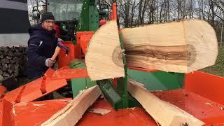 Современные станки для заготовки дров в действии