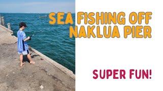 Sea fishing off Naklua pier Thailand