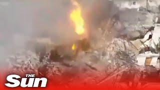 Russian T-90M tank EXPLODES as Ukrainian drone stealthily drops grenade