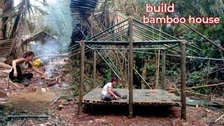 Girl building bamboo house in the forest