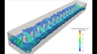 Breaking Waves on Tetrapods with XDEM