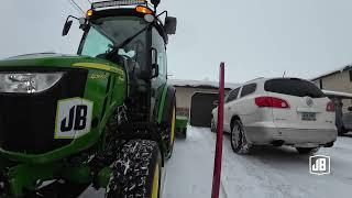 John Deere 4066R snow removal action and ice rink clearing with the Ventrac