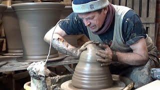 Gabriel Nichols - Throwing a medium flower pot using wild clay.