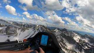 Glider Skimming the Salt River Mountain Peaks