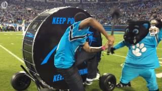 Chicago Cubs pitcher Carl Edwards Jr. beats the Keep Pounding drum at Panthers game