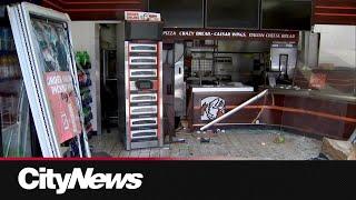 Car drives into N.W. Calgary pizza place