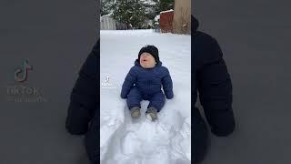 Baby talking in snow