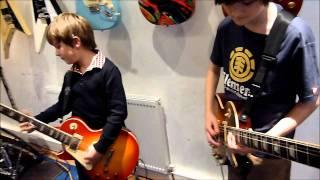 9 year old mini band guitarist Harry Esson jams with 12 year old guitarist Callum Williams