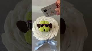 Gateau de couches garçon sur le thème du chien à offrir pour une baby shower