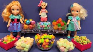 Candy store ! Elsa & Anna toddlers shop for colorful candies