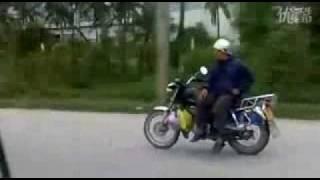 Riding side saddle on a motorbike