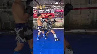 Setting up Spinning Elbows - Muay Thai Training with Kru Ot