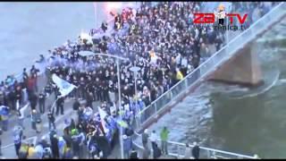 100 supporters crazy jump off a bridge in Bosnia after being written by the police