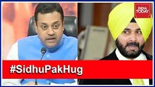 Navjot Sidhu Vs Sambit Patra Debate On Sidhu Pak Hug Controversy