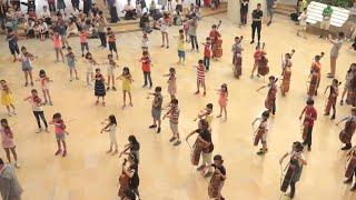 Flash Mob - Performing "I Will Follow Him" & "Jupiter"  at a Mall (HD) 