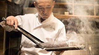 Amazing sushi chef like a samurai! Craftsmanship with fish and charcoal fire