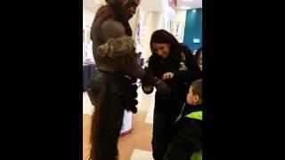 Former WWE Superstar The Boogeyman giving his bracelet to a boy