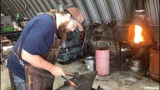 Local blacksmith makes and sells steel cookware and he shows us how to make a leaf