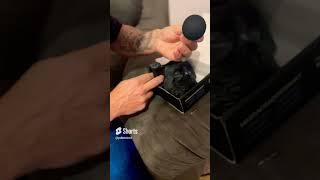 Pistola massageadora