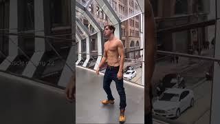 Handsome boy flexing musclesswolemattyy