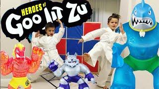 Children and new toys in  cartoon characters Heroes of Goo Jit Zu