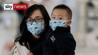 China issues travel warning as virus deaths surge