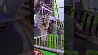 I am riding the ZIPPER at the county fair.