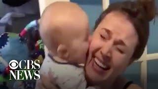 9-month-old baby covers mom in kisses in viral video