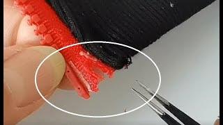 Repairing a Zipper with Super Glue and a Piece of Fabric