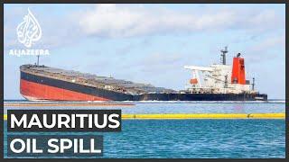 Ship leaking tonnes of oil off Mauritius splits apart