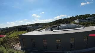 Drone flight around the new production building of RI Research Instruments in Obereschbach