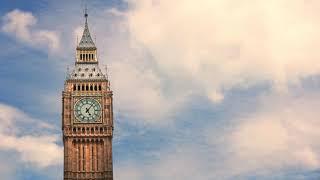 The clouds flying against  background of Big Ben. Time laps. ( Video Background Stock Footage Free )