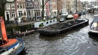 Limpiando de bicicletas canales Amsterdam