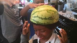 LAD GETS WATERMELON HELMET