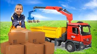 Damian and Darius Play with tractor loading and box delivery
