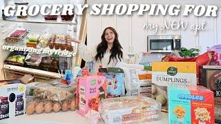 come GROCERY SHOPPING with me *for my new apartment* + haul and organizing my kitchen