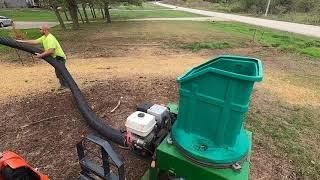 Blowning some straw by myself with the blower.