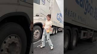 Farmer's daughter driving a truck in China!