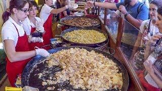 Huge Pans Cooking the Best France Food. Street Food Fair in Italy