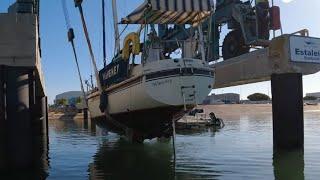 Boat getting lifted out of the water