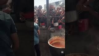 Charity in Gaza's Khan Younis distributes hot meals to displaced Palestinians